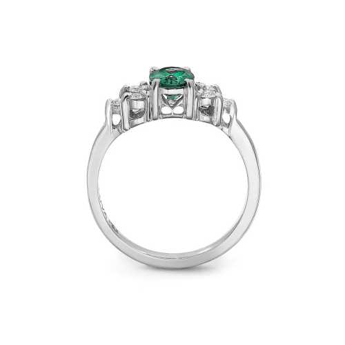 Biały pierścionek zaręczynowy z zielonym kamieniem centralnym i brylantami po bokach