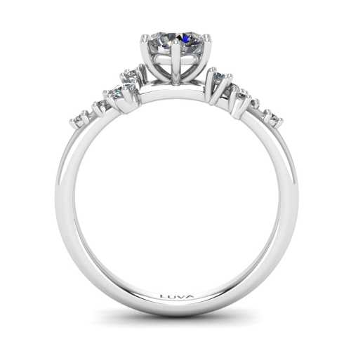 Złoty pierścionek z brylantem 0,50 w białym złocie 585 i bocznymi brylantami w szynie