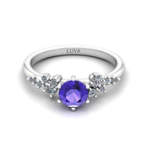 Pierścionek zaręczynowy z białego złota próby 585 z tanzanitem i brylantami po bokach