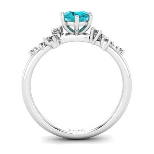 Romantyczny pierścionek zaręczynowy z topazem białe złoto próby 585 i połyskujące brylanty po bokach